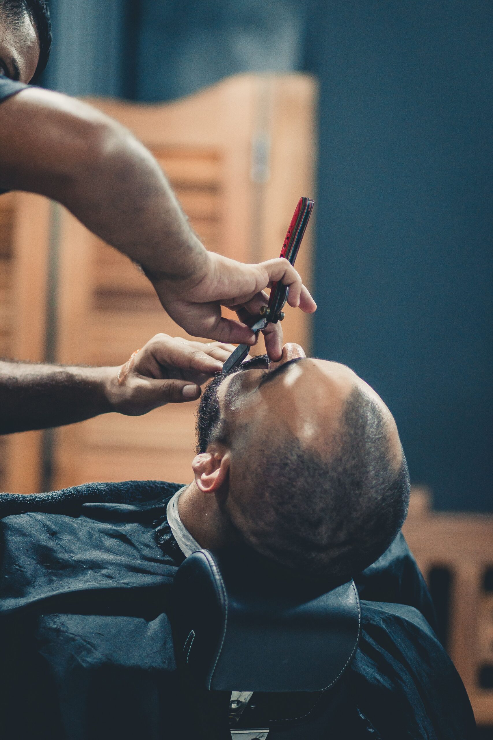 Head shave at Knucklehead Barbershop